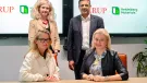Signing of the Memorandum of Understanding between Heidelberg Materials and Arup. Seated (L-R): Dame Jo da Silva, chief sustainable development officer, Arup; and Dr Katharina Beumelburg, chief sustainability and new technologies officer, Heidelberg Materials. Standing (L-R): Jemima Bruin-Bland, carbon capture and utilization lead - UKIMEA, Arup; and Mubarik Chowdhry, vice-president of global key account and product management for evoZero, Heidelberg Materials