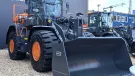 Develon DL320-7 wheel loader equipped with the updated waste and recycling kit 