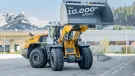The 10,000th XPower wheel loader with specially labelled bucket at the Liebherr factory in Bischofshofen
