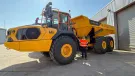 Huw Richards, group chief operating officer, with one of Walters’ new Volvo A40 articulated haulers