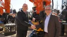 L-R: Krister Blomgren, engcon CEO, and Francesco Quaranta, HCME president and CEO