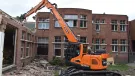 Belgium-based De Schepper Kris’s new Develon DX140RDM-7 demolition excavator at work 