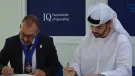 IQ President Ben Williams signing the MoU with Nahayan Alteneiji, chief executive officer of UAE’s National Safety Institute 