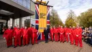 JCB’s demonstration team and Lord Bamford